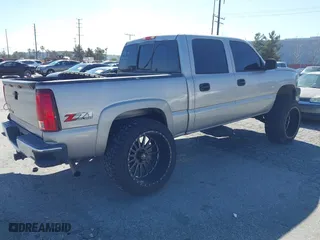 2005 Chevrolet Silverado 1500 LS with VIN 2GCEK13T351136405, listed as a IAAI auction lot 41684903 with 303,874 mi miles. Bid and sale history available at carsss.com. Image 4.