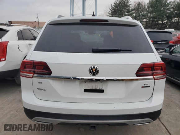 2019 Volkswagen Atlas SE z VIN 1V2UR2CA0KC589297, wystawiony jako Copart lot #80452134 z przebiegiem 95 573 mil mil oraz Szkoda całkowita • Salvage title. Historia ofert i sprzedaży dostępna na DreamBid. Obrazek 6.