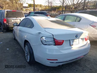 2015 BMW 4 Series 428i z VIN WBA3N3C58FK232881, wystawiony jako IAAI lot #41328639 z przebiegiem 87 770 mil mil oraz . Historia ofert i sprzedaży dostępna na DreamBid. Obrazek 14.