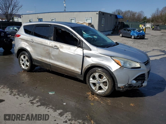 2014 Ford Escape SE with VIN 1FMCU9GX8EUA90860, listed as a Copart auction lot 54197415 with 89,098 mi miles and Salvage Title. Bid and sale history available at DreamBid. Image 4.