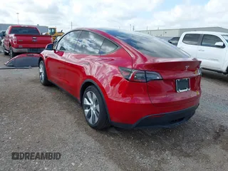 2020 Tesla Model Y Long Range with VIN 5YJYGDEE9LF009957, listed as a IAAI auction lot 41780248 with 31,053 mi miles and . Bid and sale history available at DreamBid. Image 3.