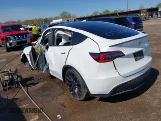 2021 Tesla Model Y Performance z VIN 5YJYGDEF0MF076263, wystawiony jako IAAI lot #42134022 z przebiegiem Nie podano mil oraz . Historia ofert i sprzedaży dostępna na DreamBid. Obrazek 3.