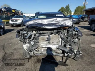 2016 Toyota RAV4 XLE with VIN JTMRFREV6GJ099491, listed as a Copart auction lot 56194465 with 92,587 mi miles and Salvage title. Bid and sale history available at DreamBid. Image 5.