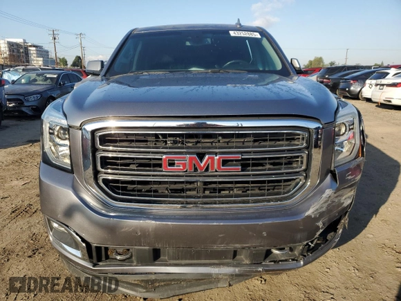 2018 GMC Yukon SLT with VIN 1GKS1BKC9JR338958, listed as a Copart auction lot 43252885 with 80,647 mi miles and Salvage Title. Bid and sale history available at carsss.com. Image 5.