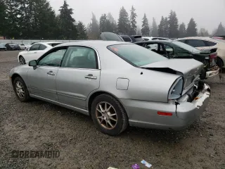 2004 Mitsubishi Diamante LS z VIN 6MMAP67P34T003796, wystawiony jako Copart lot #81683284 z przebiegiem 127 882 mil mil oraz Szkody całkowita. Historia ofert i sprzedaży dostępna na DreamBid. Obrazek 2.
