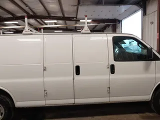 2017 Chevrolet Express Cargo Van with VIN 1GCWGBFF3H1186362, listed as a IAAI auction lot 41943220 with 163,229 mi miles. Bid and sale history available at carsss.com. Image 13.