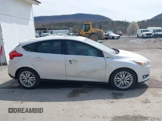 2017 Ford Focus Titanium with VIN 1FADP3N24HL331009, listed as a IAAI auction lot 42029193 with 82,068 mi miles and . Bid and sale history available at carsss.com. Image 13.