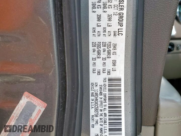 2013 Dodge Durango SXT with VIN 1C4RDHAGXDC592730, listed as a Copart auction lot 60841945 with 130,239 mi miles and Salvage title. Bid and sale history available at DreamBid. Image 13.