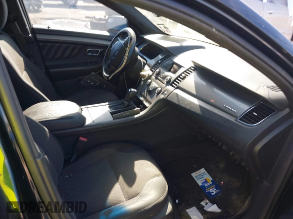 2014 Ford Taurus SEL z VIN 1FAHP2E84EG170133, wystawiony jako IAAI lot #41045369 z przebiegiem 261 732 mil mil oraz . Historia ofert i sprzedaży dostępna na DreamBid. Obrazek 5.