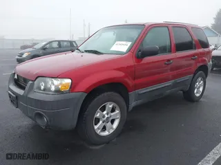 2007 Ford Escape XLT with VIN 1FMCU03147KC00069, listed as a IAAI auction lot 41343434 with 209,220 mi miles. Bid and sale history available at carsss.com. Image 2.