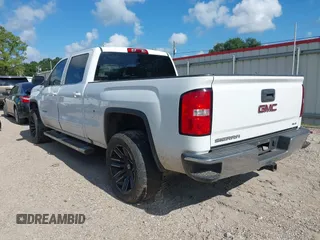 2017 GMC Sierra 1500 SLE with VIN 3GTU2MEC6HG239985, listed as a IAAI auction lot 42542350 with 241,340 mi miles and . Bid and sale history available at DreamBid. Image 3.