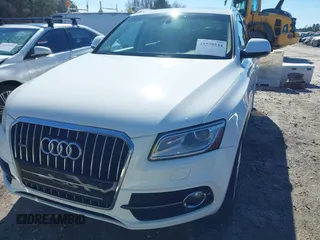 2014 Audi Q5 Premium Plus z VIN WA1DGAFP3EA062706, wystawiony jako IAAI lot #41579534 z przebiegiem 121 055 mil mil oraz . Historia ofert i sprzedaży dostępna na DreamBid. Obrazek 6.