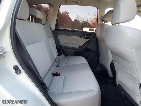 2016 Subaru Forester 2.5i with VIN JF2SJAAC5GH477170, listed as a Copart auction lot 77338314 with 71,975 mi miles and Salvage Title. Bid and sale history available at carsss.com. Image 11.