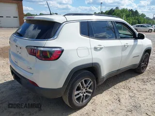 2017 Jeep Compass Latitude with VIN 3C4NJDBB3HT688695, listed as a IAAI auction lot 42197797 with 110,343 mi miles and . Bid and sale history available at DreamBid. Image 4.