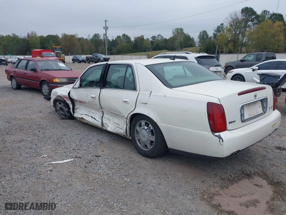 2005 Cadillac DeVille with VIN 1G6KD54Y75U162964, listed as a IAAI auction lot 40794096 with 165,341 mi miles. Bid and sale history available at carsss.com. Image 3.