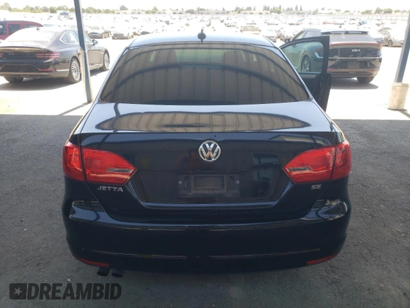 2014 Volkswagen Jetta SE with VIN 3VWD17AJXEM445488, listed as a Copart auction lot 65282425 with 159,356 mi miles and Salvage title. Bid and sale history available at DreamBid. Image 6.