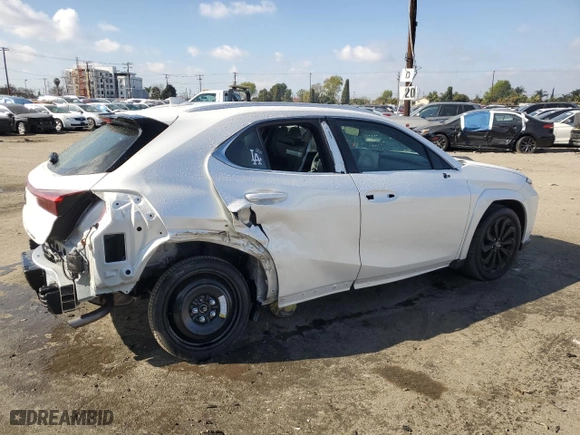 2024 Lexus UX with VIN JTHP9JBH7R2073444, listed as a Copart auction lot 43447265 with 7851 miles and Salvage Title. Bid and sale history available at carsss.com. Image 3.