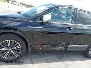 2024 Volkswagen Tiguan with VIN 3VVTB7AX9RM218526, listed as a IAAI auction lot 42564195 with Not provided miles and . Bid and sale history available at DreamBid. Image 6.