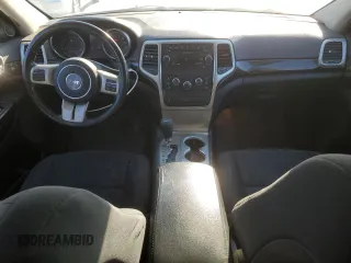2012 Jeep Grand Cherokee Laredo with VIN 1C4RJFAG2CC267890, listed as a Copart auction lot 87832115 with 171,552 mi miles and Salvage Title. Bid and sale history available at carsss.com. Image 8.