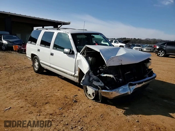 1999 GMC Yukon with VIN 1GKEC13R0XJ811710, listed as a Copart auction lot 43014995 with 311,948 mi miles and Salvage Title. Bid and sale history available at carsss.com. Image 12.