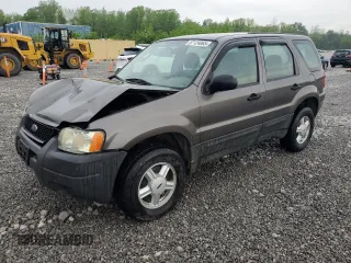 2004 Ford Escape XLS with VIN 1FMCU92154KA32878, listed as a Copart auction lot 57124065 with 156,816 mi miles and Salvage title. Bid and sale history available at DreamBid. Image 1.
