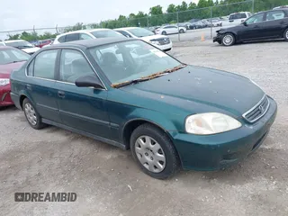 1999 Honda Civic LX z VIN 1HGEJ6678XL047636, wystawiony jako IAAI lot #42230561 z przebiegiem 127 439 mil mil oraz . Historia ofert i sprzedaży dostępna na DreamBid. Obrazek 1.