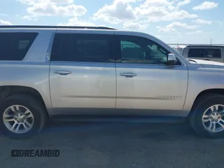 2017 Chevrolet Suburban LT with VIN 1GNSCHKC9HR287701, listed as a IAAI auction lot 42510491 with 166,568 mi miles and . Bid and sale history available at DreamBid. Image 13.
