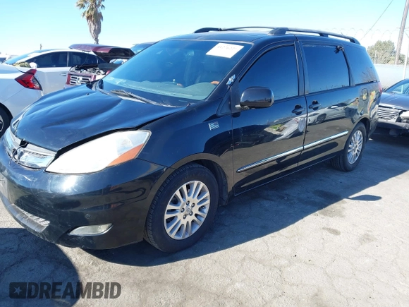 2009 Toyota Sienna XLE with VIN 5TDZK22C69S273555, listed as a IAAI auction lot 41276221 with 129,160 mi miles and . Bid and sale history available at DreamBid. Image 17.