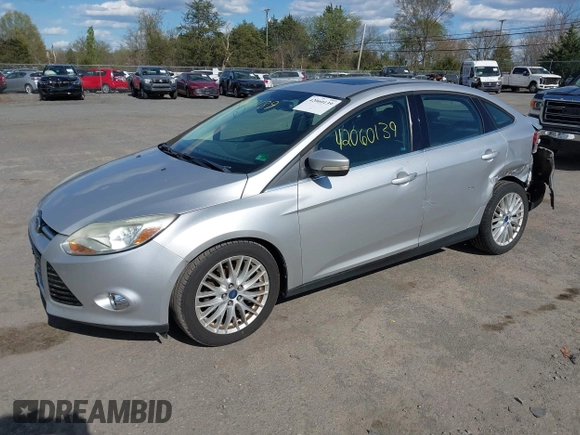 2012 Ford Focus SEL with VIN 1FAHP3H29CL151658, listed as a IAAI auction lot 42060139 with 149,547 mi miles and . Bid and sale history available at carsss.com. Image 17.