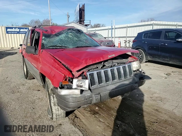 1998 Jeep Grand Cherokee Laredo with VIN 1J4GZ58S7WC105854, listed as a Copart auction lot 82321254 with 178,072 mi miles and Salvage Title. Bid and sale history available at carsss.com. Image 12.