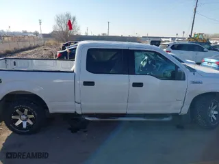 2015 Ford F-150 XLT w/HD Payload Pkg with VIN 1FTFW1EG7FFB09470, listed as a IAAI auction lot 41455246 with 152,766 mi miles. Bid and sale history available at carsss.com. Image 13.