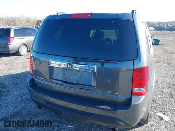 2012 Honda Pilot Touring with VIN 5FNYF3H9XCB042090, listed as a IAAI auction lot 41751359 with 140,424 mi miles and . Bid and sale history available at carsss.com. Image 16.