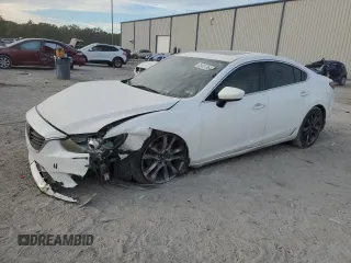 2015 Mazda 6 i Grand Touring with VIN JM1GJ1W60F1173470, listed as a Copart auction lot 83457864 with 145,379 mi miles and Salvage Title. Bid and sale history available at carsss.com. Image 1.