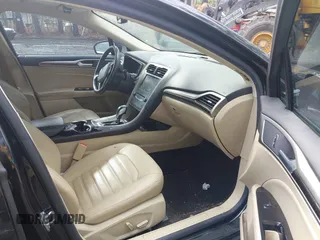 2015 Ford Fusion SE Hybrid with VIN 3FA6P0LU5FR190333, listed as a IAAI auction lot 41802327 with 256,747 mi miles. Bid and sale history available at carsss.com. Image 5.