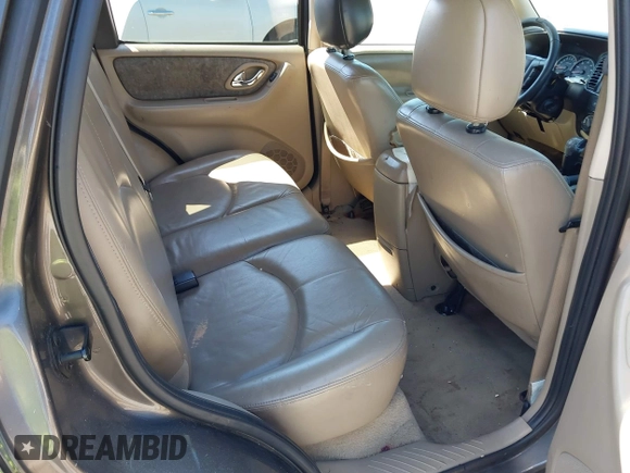 2006 Mazda Tribute i with VIN 4F2YZ02Z36KM29148, listed as a IAAI auction lot 42044163 with 175,786 mi miles and . Bid and sale history available at carsss.com. Image 8.