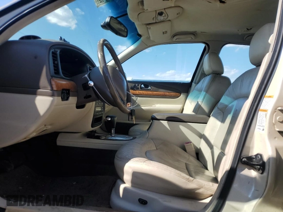 1999 Lincoln Continental with VIN 1LNHM97V1XY610090, listed as a Copart auction lot 50447685 with 105,375 mi miles and Clean title. Bid and sale history available at DreamBid. Image 7.