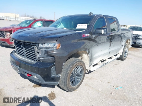 2021 Chevrolet Silverado 1500 LT Trail Boss with VIN 1GCPYFEL6MZ148202, listed as a IAAI auction lot 41908592 with 77,048 mi miles and . Bid and sale history available at DreamBid. Image 2.