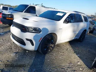 2023 Dodge Durango R/T Plus z VIN 1C4SDHCTXPC567522, wystawiony jako IAAI lot #41339712 z przebiegiem 55 386 mil mil oraz . Historia ofert i sprzedaży dostępna na DreamBid. Obrazek 2.
