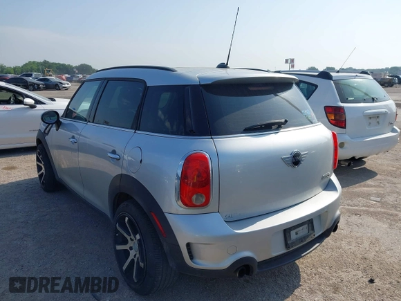 2013 MINI Countryman S z VIN WMWZC3C59DWP22638, wystawiony jako IAAI lot #42327540 z przebiegiem 155 060 mil mil oraz . Historia ofert i sprzedaży dostępna na DreamBid. Obrazek 3.