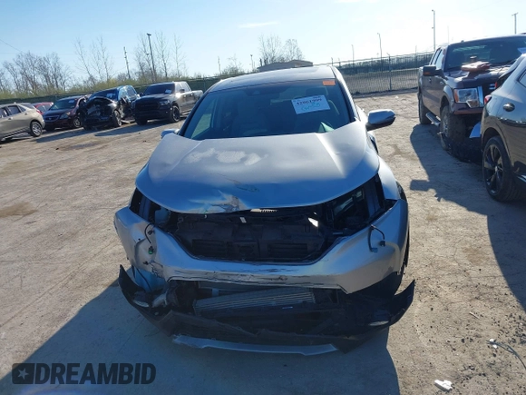 2018 Honda CR-V EX with VIN 7FARW2H56JE097214, listed as a IAAI auction lot 42061999 with 74,862 mi miles and . Bid and sale history available at DreamBid. Image 13.