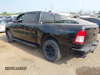 2021 Ram 1500 Big Horn with VIN 1C6SRFFT4MN818902, listed as a IAAI auction lot 42581851 with 58,615 mi miles and . Bid and sale history available at DreamBid. Image 3.