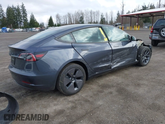 2023 Tesla Model 3 with VIN 5YJ3E1EA2PF623217, listed as a IAAI auction lot 41701413 with 21,246 mi miles and . Bid and sale history available at DreamBid. Image 4.