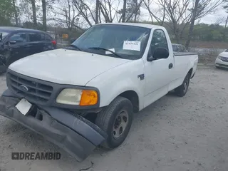 2004 Ford F-150 XL with VIN 2FTRF17W24CA02353, listed as a IAAI auction lot 41935141 with 306,280 mi miles and . Bid and sale history available at DreamBid. Image 2.