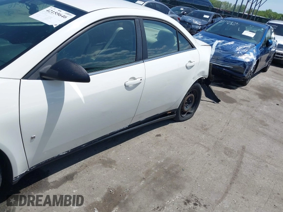 2008 Pontiac G6 1SV Value Leader z VIN 1G2ZF57B184150315, wystawiony jako IAAI lot #42155646 z przebiegiem 350 654 mil mil oraz . Historia ofert i sprzedaży dostępna na DreamBid. Obrazek 17.