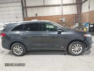 2016 Kia Sorento LX with VIN 5XYPGDA39GG170291, listed as a IAAI auction lot 42045883 with 136,848 mi miles. Bid and sale history available at carsss.com. Image 13.