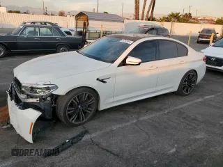 2019 BMW M5 with VIN WBSJF0C53KB284878, listed as a Copart auction lot 86763564 with 0 mi miles and Salvage Title. Bid and sale history available at carsss.com. Image 1.