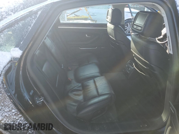 2010 Audi A8 z VIN WAURVAFA7AN007320, wystawiony jako Copart lot #88761015 z przebiegiem Nie podano mil oraz Szkoda całkowita • Salvage title. Historia ofert i sprzedaży dostępna na DreamBid. Obrazek 10.