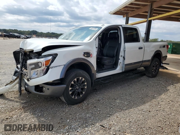 2018 Nissan Titan Platinum Reserve with VIN 1N6BA1F49JN521225, listed as a Copart auction lot 69831004 with 92,536 mi miles and Salvage title. Bid and sale history available at DreamBid. Image 1.