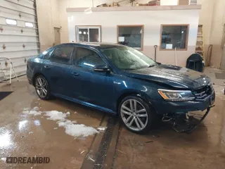 2018 Volkswagen Passat 2.0T S with VIN 1VWAA7A38JC013787, listed as a IAAI auction lot 41587362 with 127,970 mi miles. Bid and sale history available at carsss.com. Image 1.