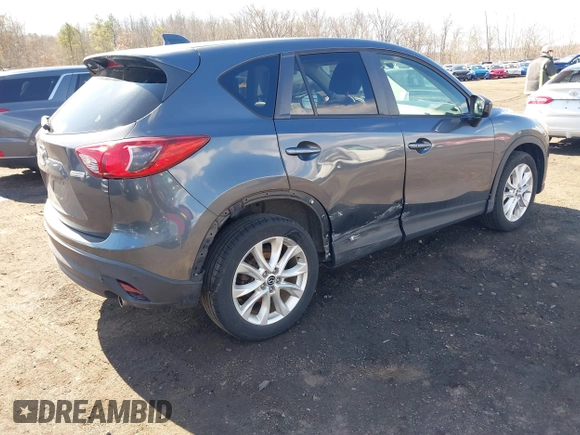 2013 Mazda CX-5 Grand Touring with VIN JM3KE4DE1D0164488, listed as a IAAI auction lot 41683326 with 129,989 mi miles. Bid and sale history available at carsss.com. Image 4.